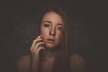 Fototapeta premium Studio portraits with red hair girl