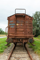Fototapeta na wymiar Vienna, Austria-September 06,2012:.old rusty wagon with graffiti standing abandoned on in track