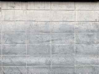 old light gray brick wall