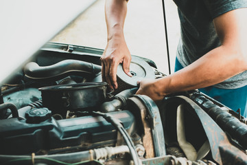 mechanic repair maintenance checking air filter engine,Repair fix a car concept