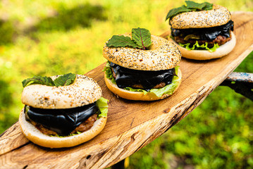 burgers with beef cutlet and black cheese