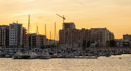 Urban port view at sunset in Vinaroz, Spain