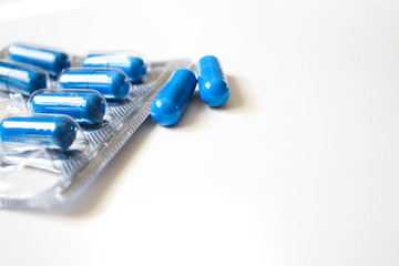 Capsules medicine on a white background