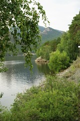 Fototapeta premium Panoramic view on lake in the mountains 