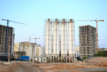 Stationary concrete batching plant on construction site. Producing сoncrete for construction and...