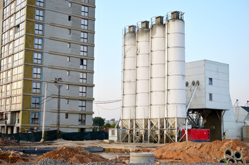 Stationary concrete batching plant on construction site. Producing сoncrete for construction and...