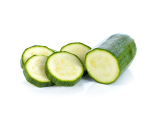 green zucchini vegetables isolated on white