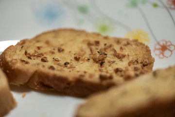 homemade garlic bread in white plate, Sensitive Focus