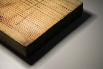 Wooden board on a gray background