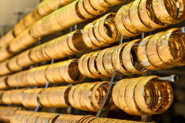 Rows of gold bracelets as a background in a jewelry store on the Grand Bazaar. Istanbul, Turkey