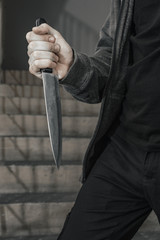 man with a knife i on the landing. the killer hides with covers the knife before the attack. topics...
