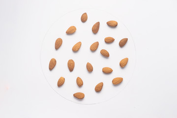 Fototapeta premium Almond nuts isolated on white backgroud.