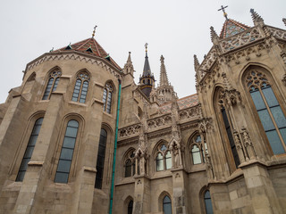 Fototapeta premium Matthias Church is a Roman Catholic church located, Budapest, Hungary, in front of the Fisherman's Bastion at the heart of Buda's Castle District.It was originally built in Romanesque style in 1015.
