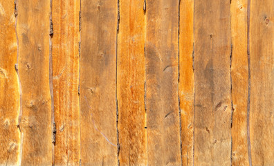 Wall of old unplanered boards. Background and texture. Pattern
