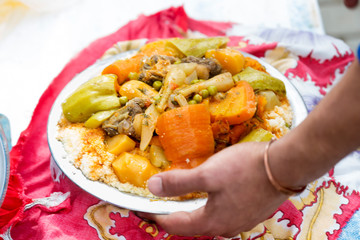Couscous Bidaoui. Moroccan couscous with chicken & 7 seven vegetables - carrots, leeks, courgettes,...