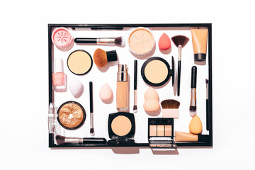 Top view of women's makeup products