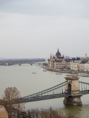 Fototapeta na wymiar The Széchenyi Chain Bridge is a suspension bridge that spans the River Danube between Buda and Pest, the western and eastern sides of Budapest, the capital of Hungary.