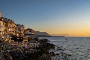 A sunset view from the rocky coast of Cefalu
