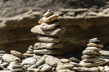 Close-up of a pile of stones in balance, Zen concept. Vernazza, Liguria, Italy
