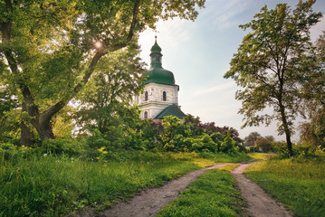 Country road to old church, historic outdoor background