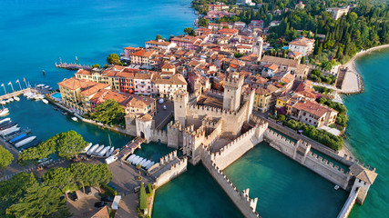 Aerial view to the town of Sirmione, popular travel destination on Lake Garda in Italy - 285809680