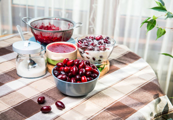 Cook  jam, confiture   from dogwood berries