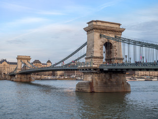 Budapest, Hungary - Mar 9th 2019: The Széchenyi Chain Bridge is a suspension bridge that spans the River Danube between Buda and Pest, the western and eastern sides of Budapest, the capital of Hungary