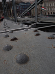 Fototapeta na wymiar Old rivet metal at Széchenyi Chain Bridge, Budapest Hungary