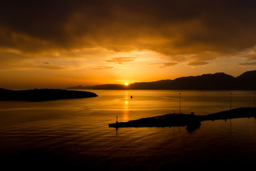 Fototapeta na wymiar Sunset in Agios Nikolaos, Crete, Greece 