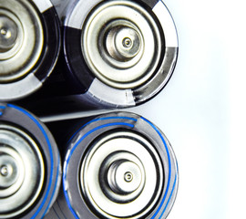 Salt and alkaline batteries, source of energy for portable technology. AAA and AA batteries