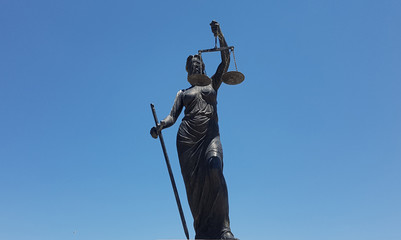 Sculpture of Themis, mythological Greek goddess, symbol of justice