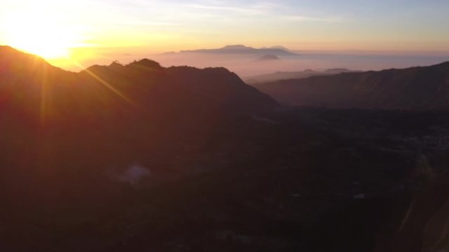 AERIAL: Landscape of caldera Bromo volcano in early morning, Java island, Indonesia