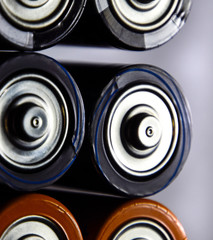 Salt and alkaline batteries, source of energy for portable technology. AAA and AA batteries