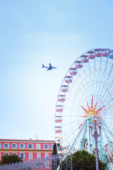 Fototapeta premium Ferris wheel against a blu sky