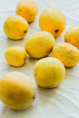 A group of bright orange melon berries.