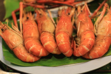 Grill river shrimps in the night 