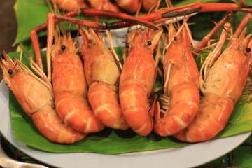 Grill river shrimps in the night 