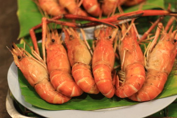 Grill river shrimps in the night 