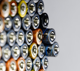 Salt and alkaline batteries, source of energy for portable technology. AAA and AA batteries