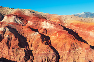 Red mountains in Kyzyl-Chin valley, also called as Mars valley. Altai, Siberia, Russia