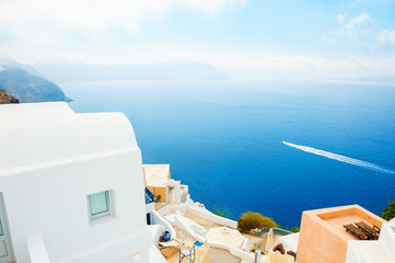 Foggy morning at Santorini island, Greece. Summer landscape, sea view.