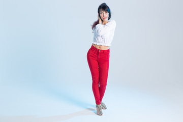 Latin dance, contemporary dance, bachata solo and cha-cha-cha concept - portrait of a young woman...