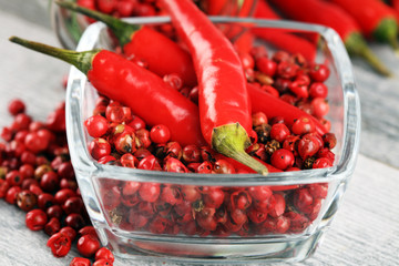 red hot bird chili pepper with pepper corns