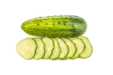 Whole cucumber and sliced cucumber on white.