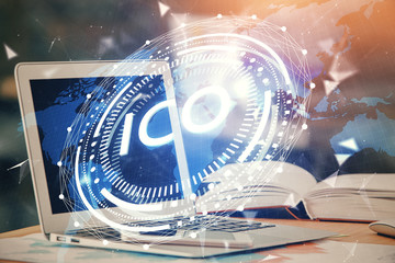 Double exposure of blockchain and crypto economy theme hologram and table with computer background....