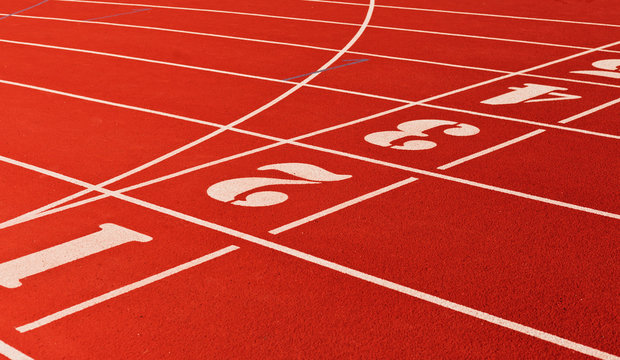 Stadium running track with red coating and numbers closeup © splitov27
