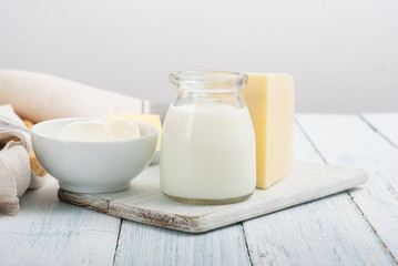 dairy products on old white wooden table