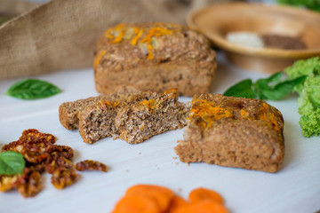 Dietary bread without yeast from whole grain flour. Healthy food, bread with vegetables and bran.