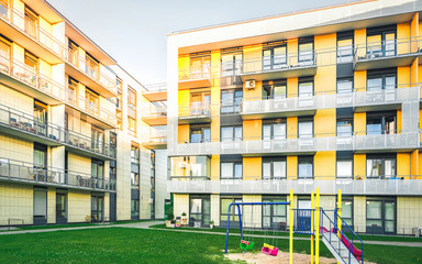 EU Modern apartment residential buildings children playground