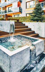 Decorative fountain at Modern complex of residential buildings